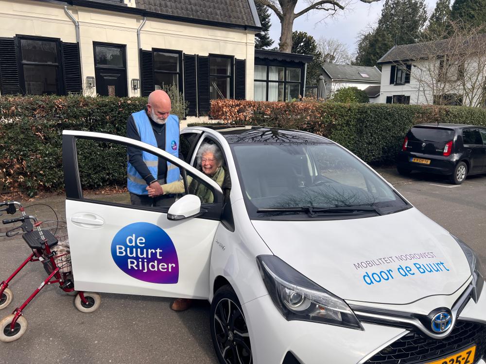 Buurtrijder met passagier
